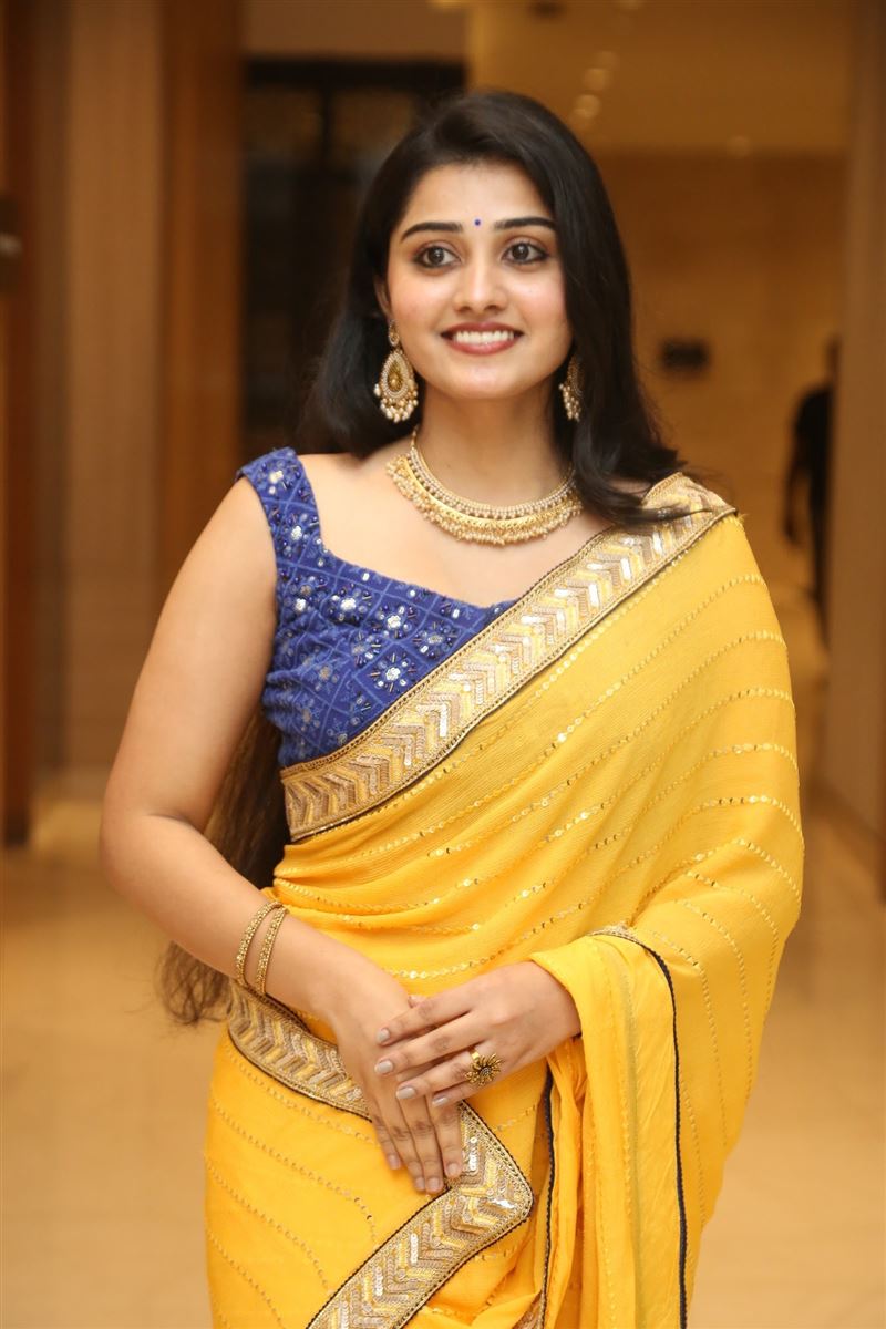 Telugu Actress Athira Raj Stills in yellow Saree